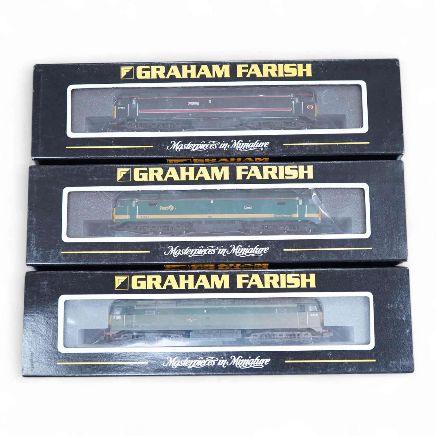 Three boxed Graham Farish N gauge railway Class 47 Co-Co diesel-electric locomotives; a First Great Western, 47832 (371226), a BR, D1505 (371-231), and a Fragonset Railways, Waverley 47701 (371227).